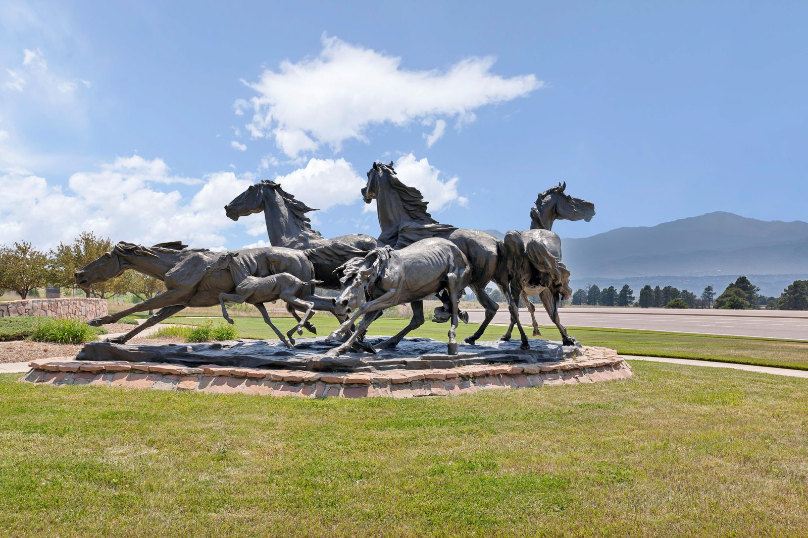 Bronze running horses monument in Briargate, Colorado Springs
