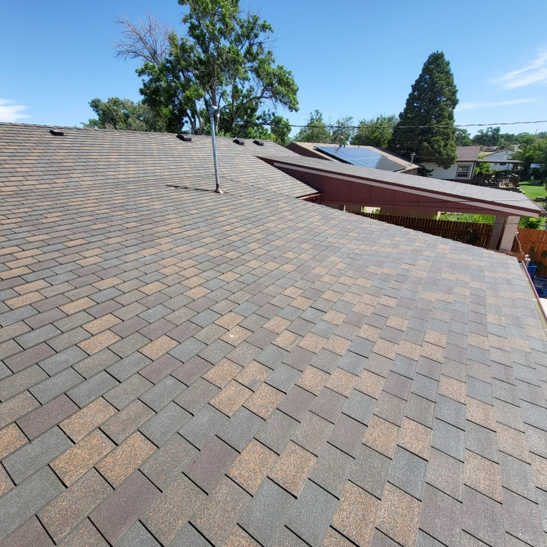 Certified roofer installing Class 4 shingles on Colorado Springs residential roof