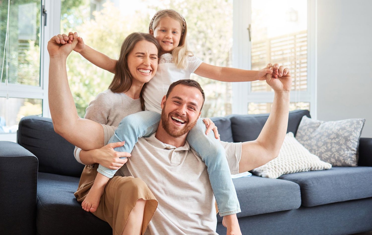 Happy family enjoying a fresh, odor-free home after Fixins restoration in Colorado Springs
