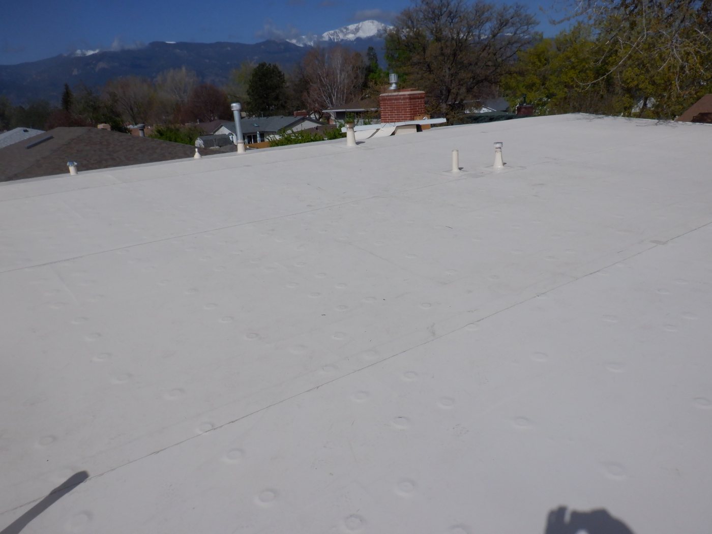 New TPO membrane roof installed by Fixins on a residential home in Colorado Springs
