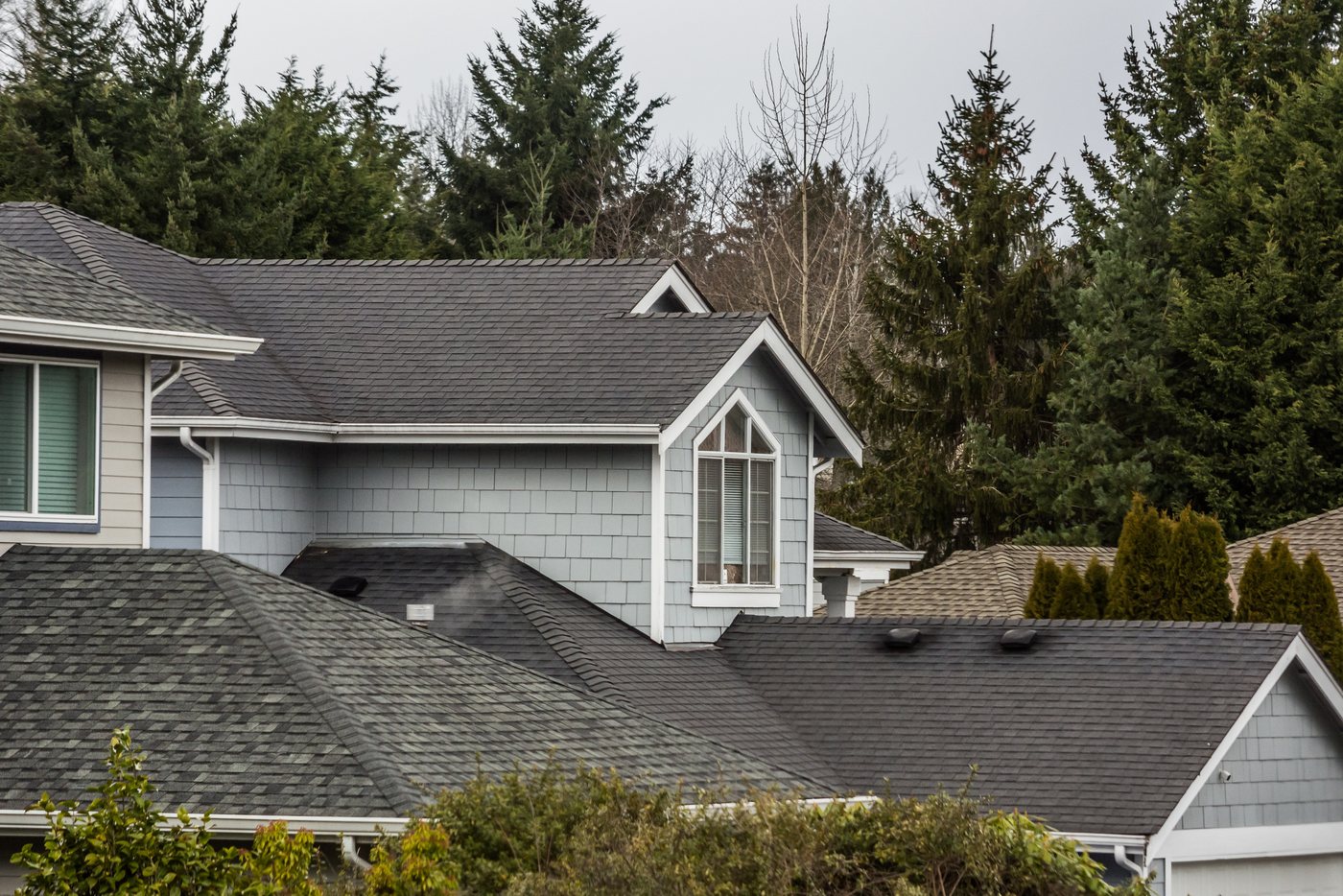 Asphalt shingle roofline on a Colorado Springs home installed by Fixins