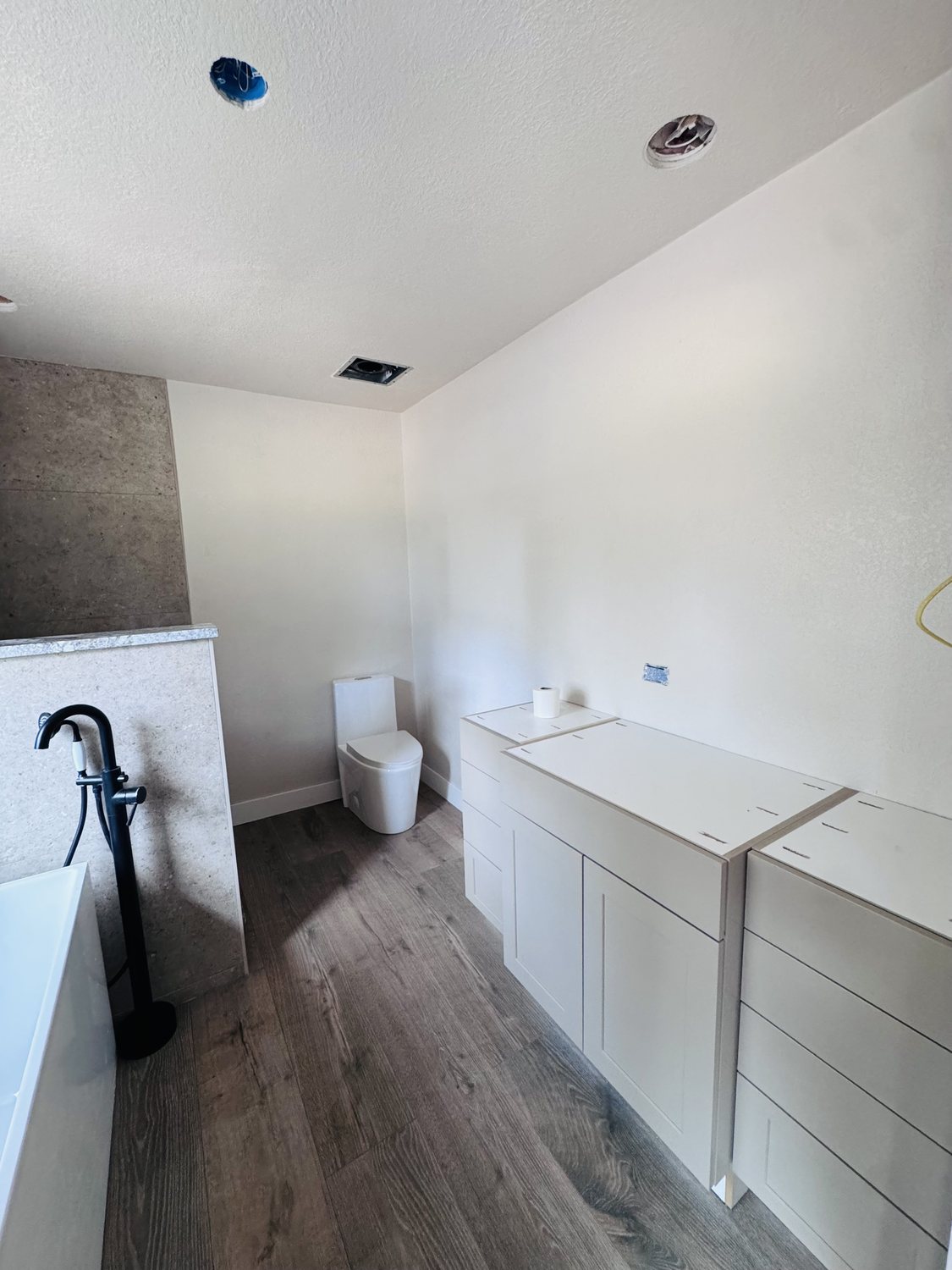 Custom shaker vanity and cabinetry in a Fixins bathroom remodel, Colorado Springs