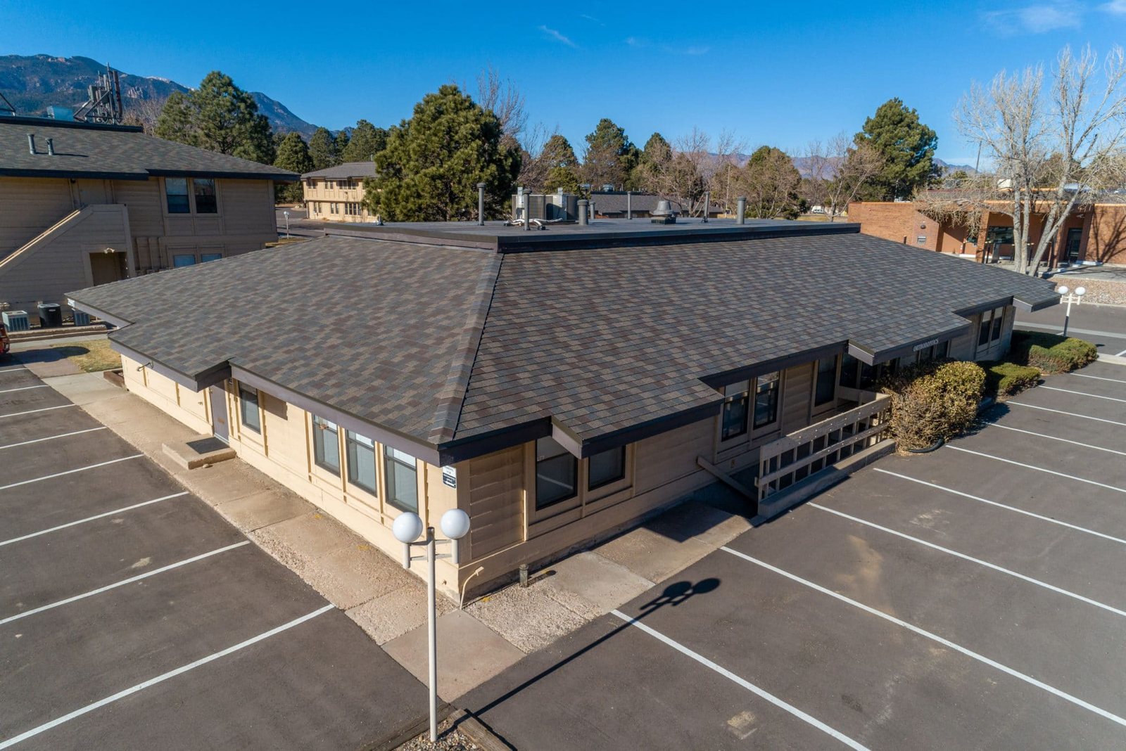 F-Wave REVIA synthetic shingle roof on the Country Club Corners office park in Colorado Springs