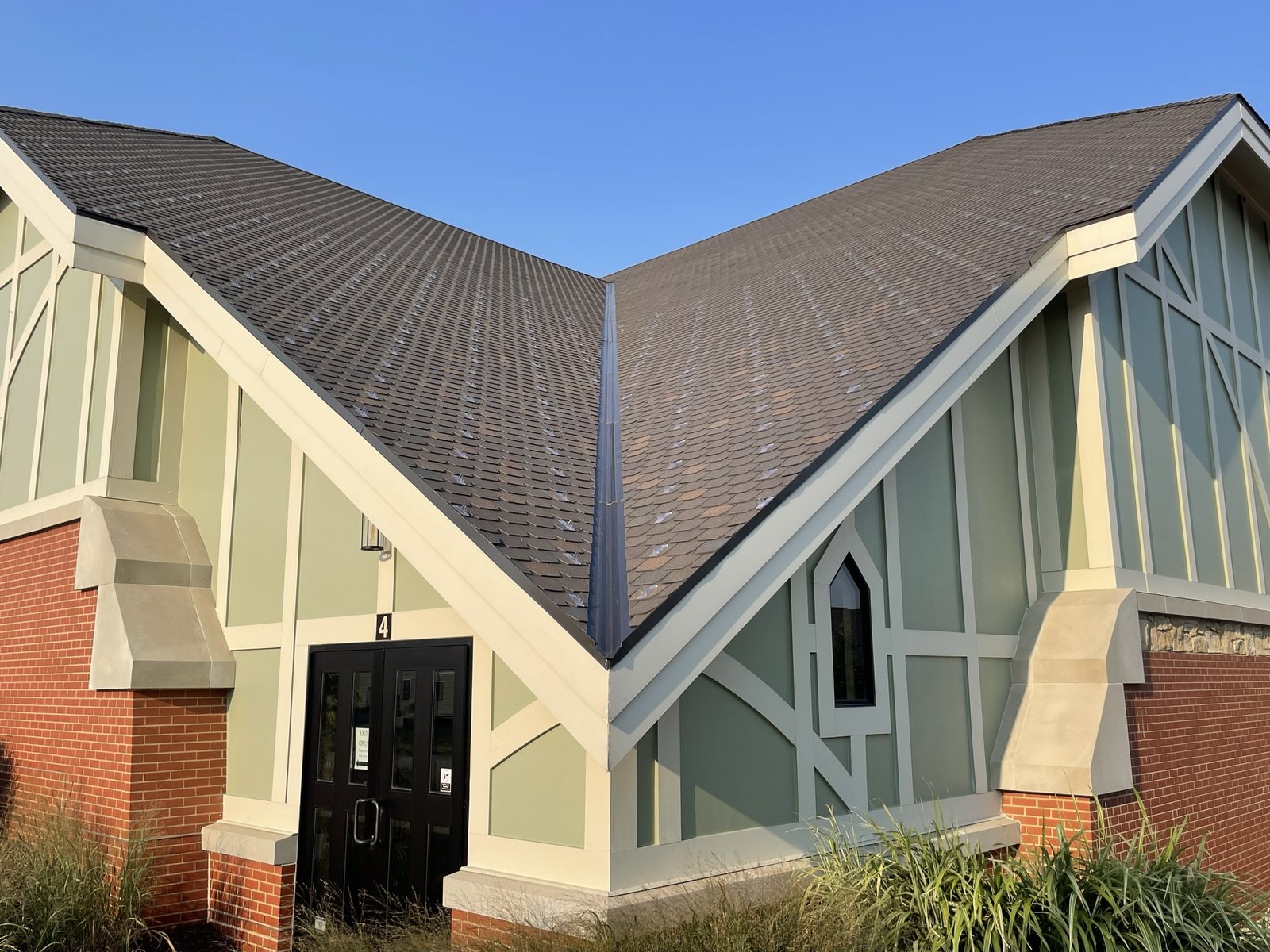 F-Wave REVIA synthetic shingle roof with Sonoma blend on the Trinity Methodist church, installed by Fixins