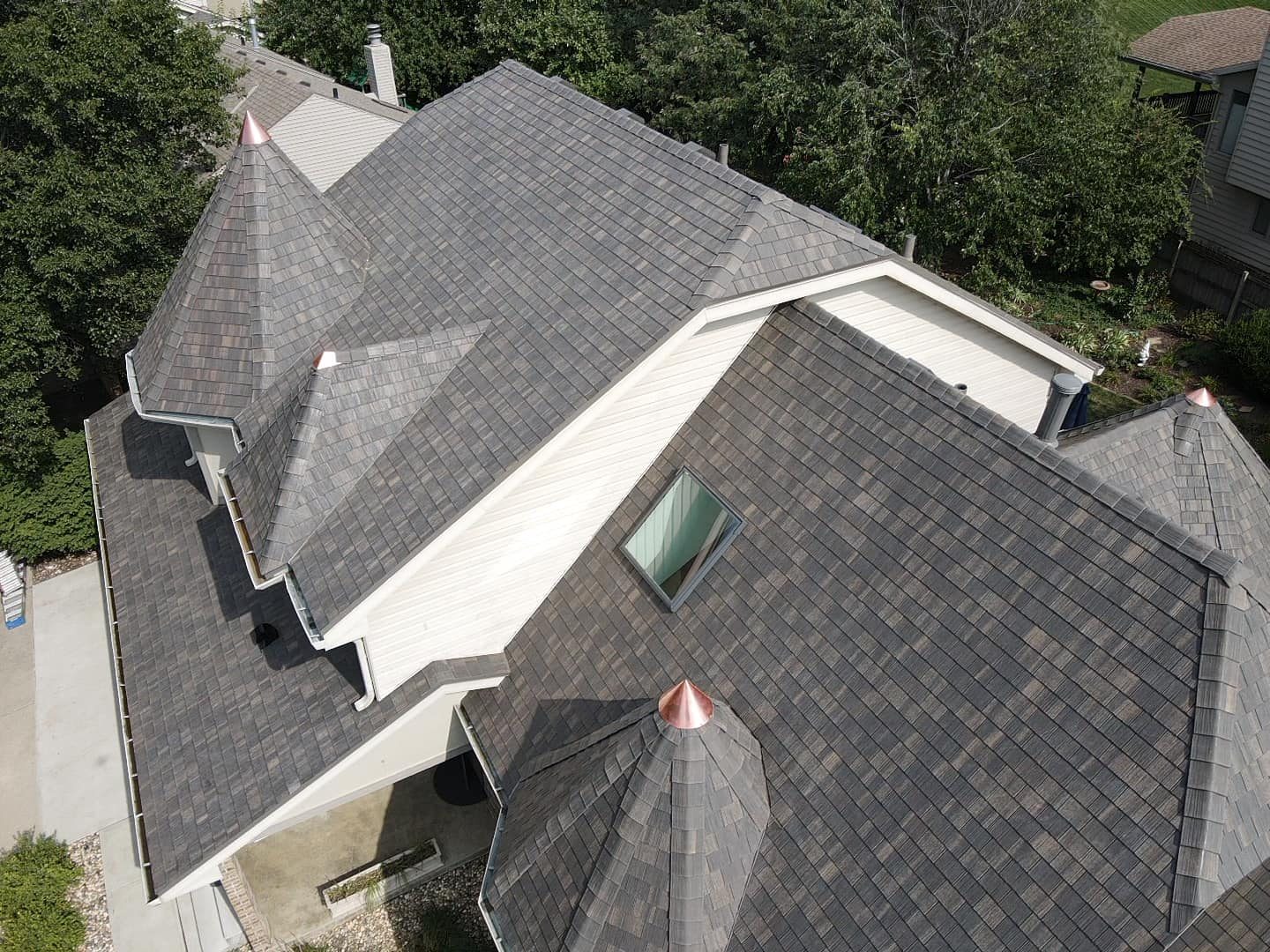 Roof insurance claim inspection on a slate roof with turrets