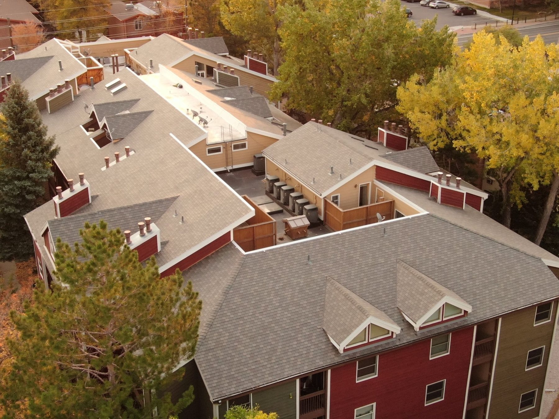 Aerial view of a completed multifamily roofing project in Colorado Springs by Fixins