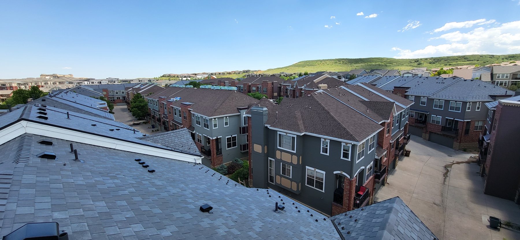 Aerial view of a Colorado Springs residential neighborhood roofed by Fixins