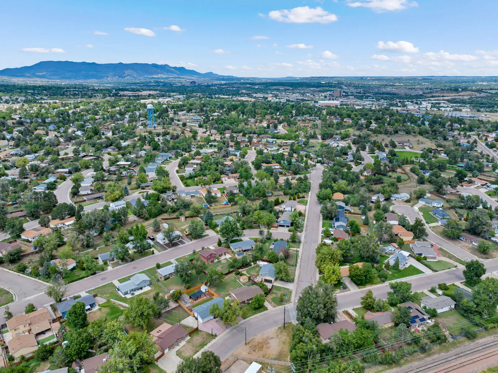 Aerial view of homes and tree lined streets in the Fort Carson area of south Colorado Springs
