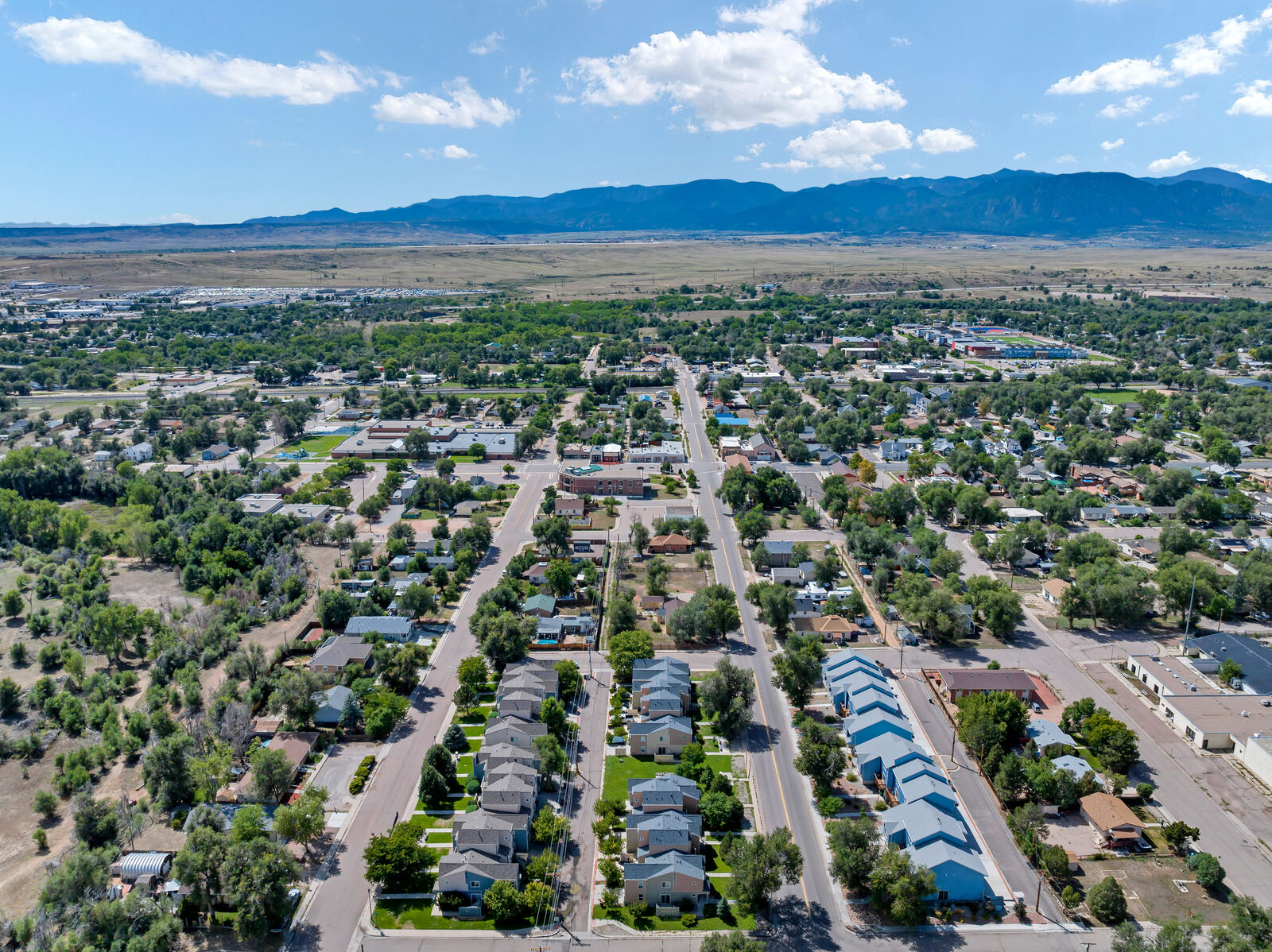 Aerial view of Fountain, Colorado looking across town toward the Front Range mountains